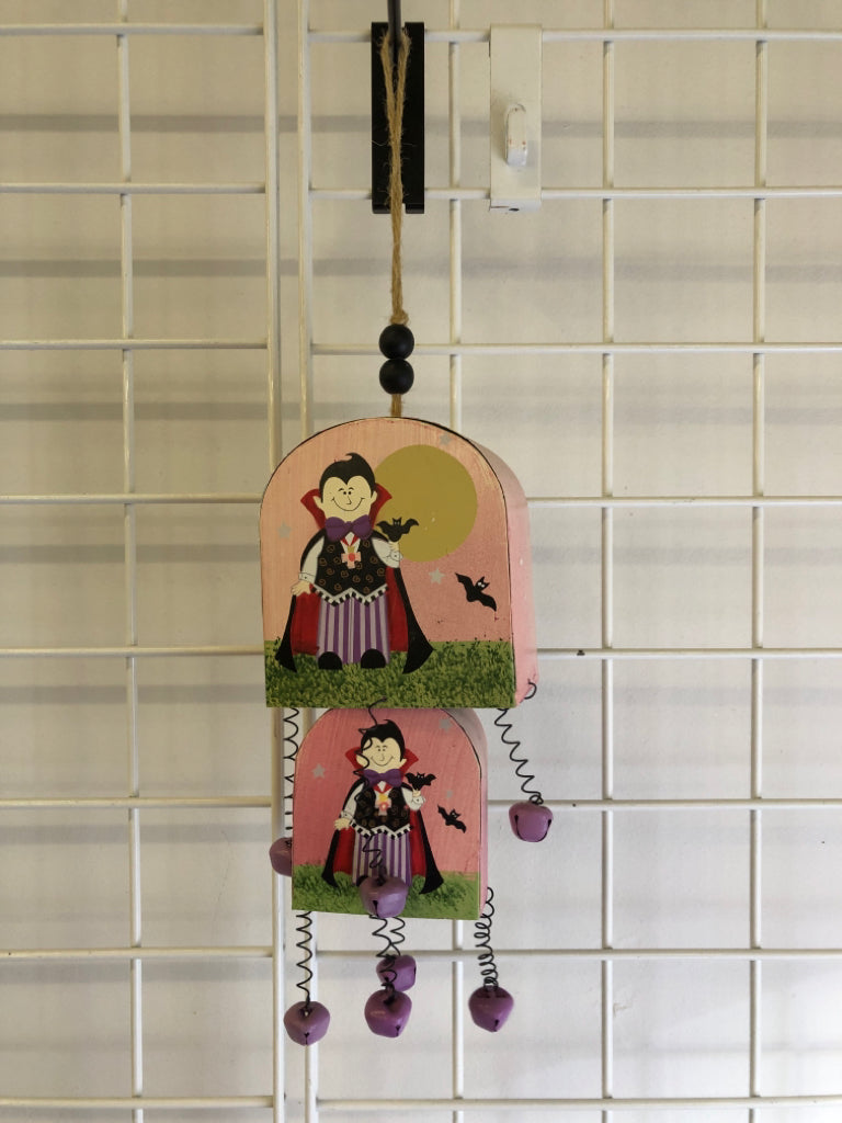 METAL PAINTED DRACULA BELL WALL HANGING.