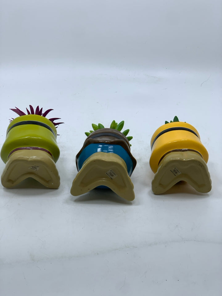 3 FAUX SUCCULENTS IN RESIN 7 DWARFS PLANTERS.