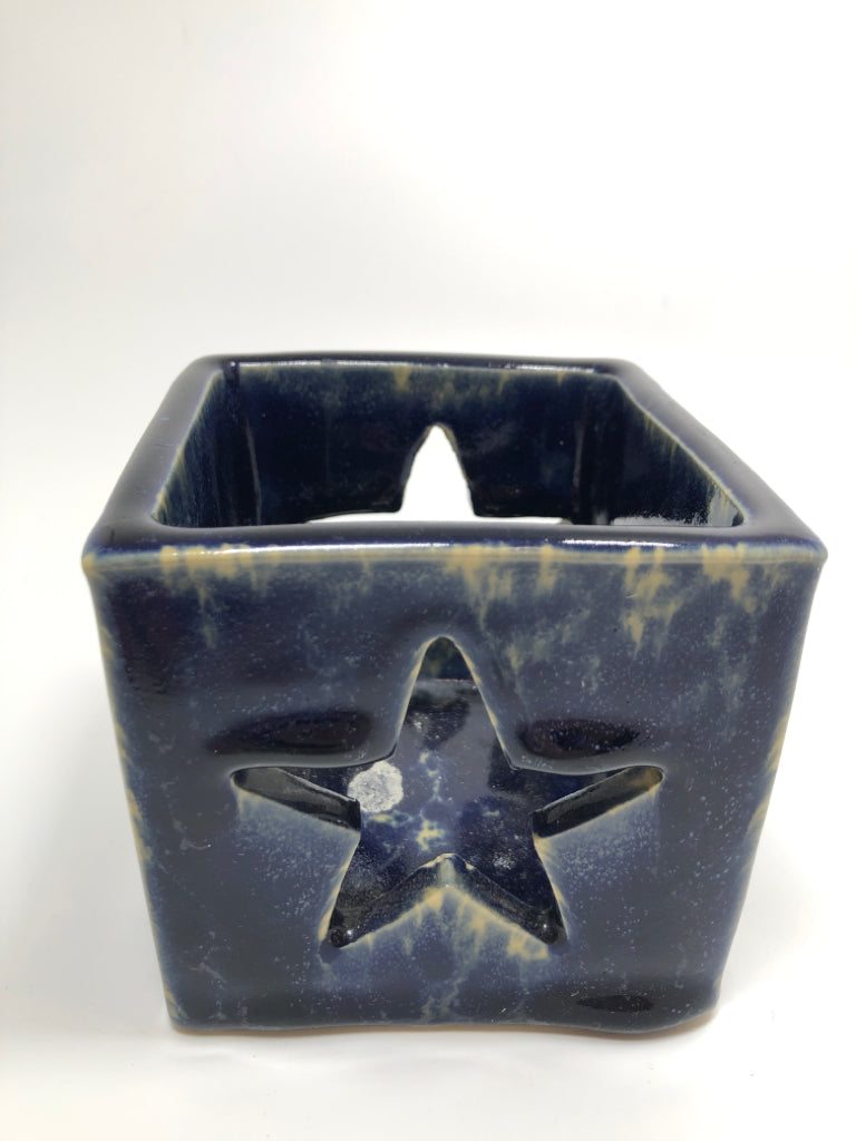 HEART CUT-OUT VOTIVE HOLDER.