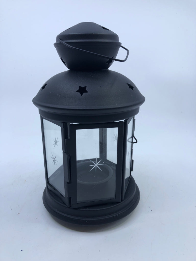 BLACK METAL STARS CUTOUT LANTERN.