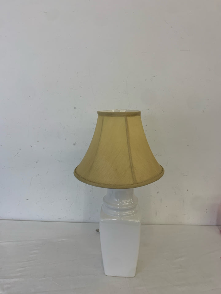 WHITE BASE LAMP W TAN SHADE.