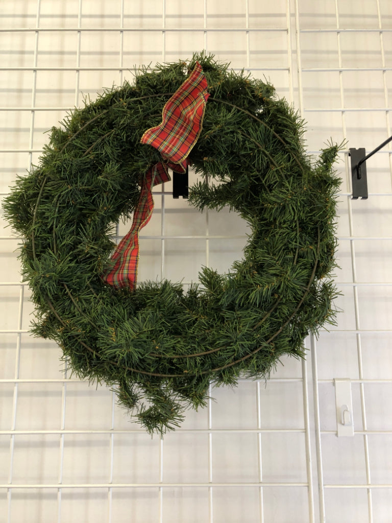 GREENS WREATH W/ PLAID BOW.