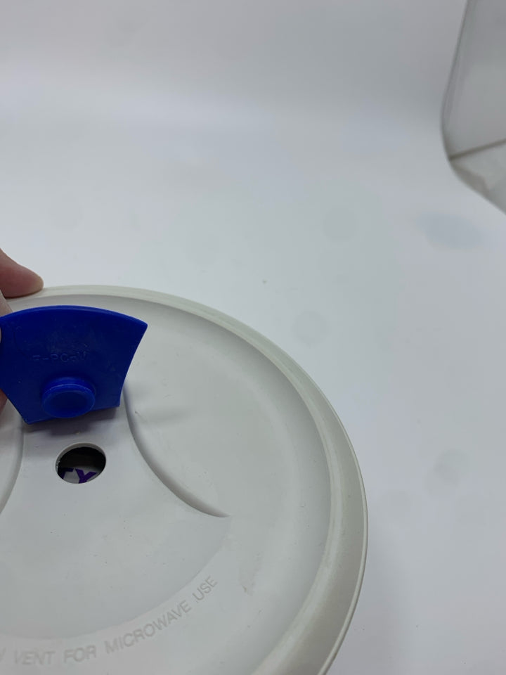 COVERED CORNING WARE DISH.