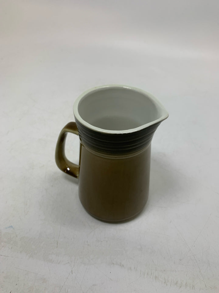FADED BROWN CREAMER.