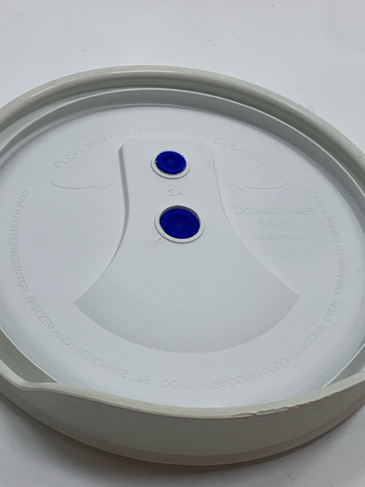 COVERED CORNING WARE DISH.