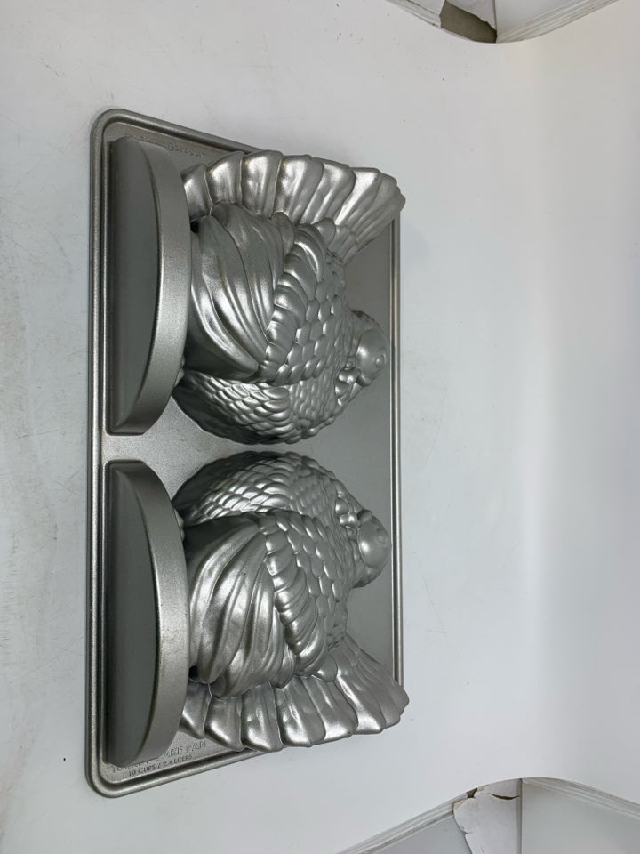 NORDIC WARE TURKEY CAKE PAN.