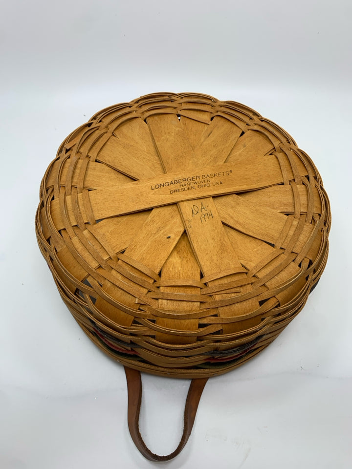 1994 ROUND BASKET W/LEATHER HANDLES.