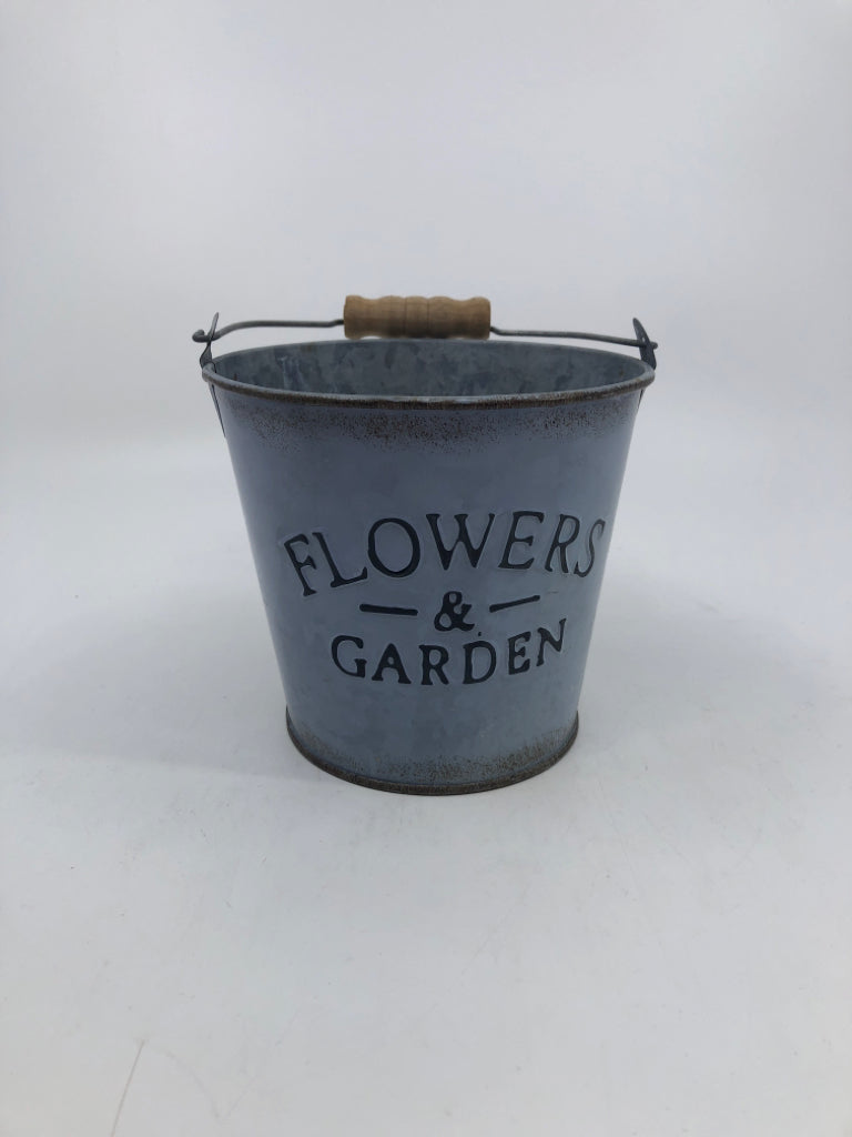 FLOWERS AND GARDEN METAL BUCKET.