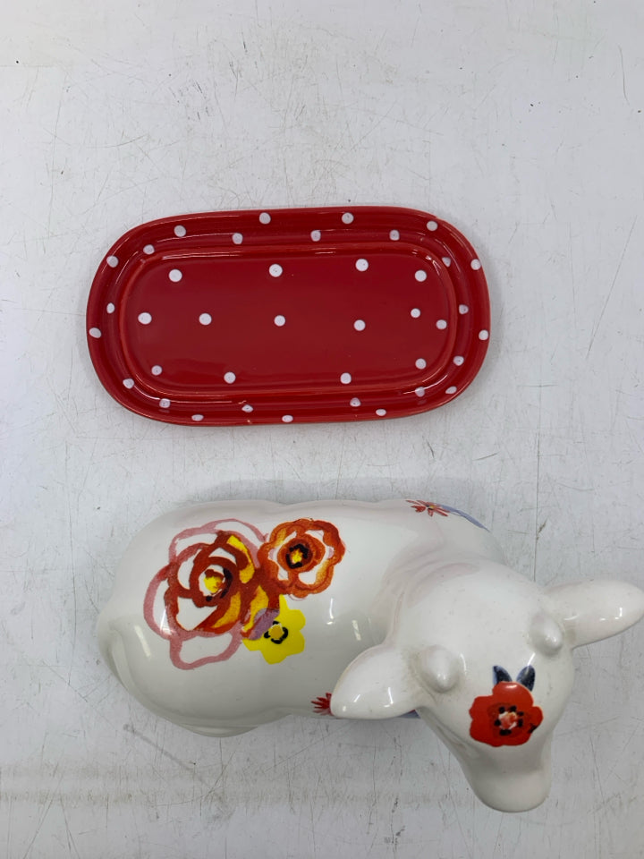 WHITE FLORAL COW SHAPED BUTTER DISH.