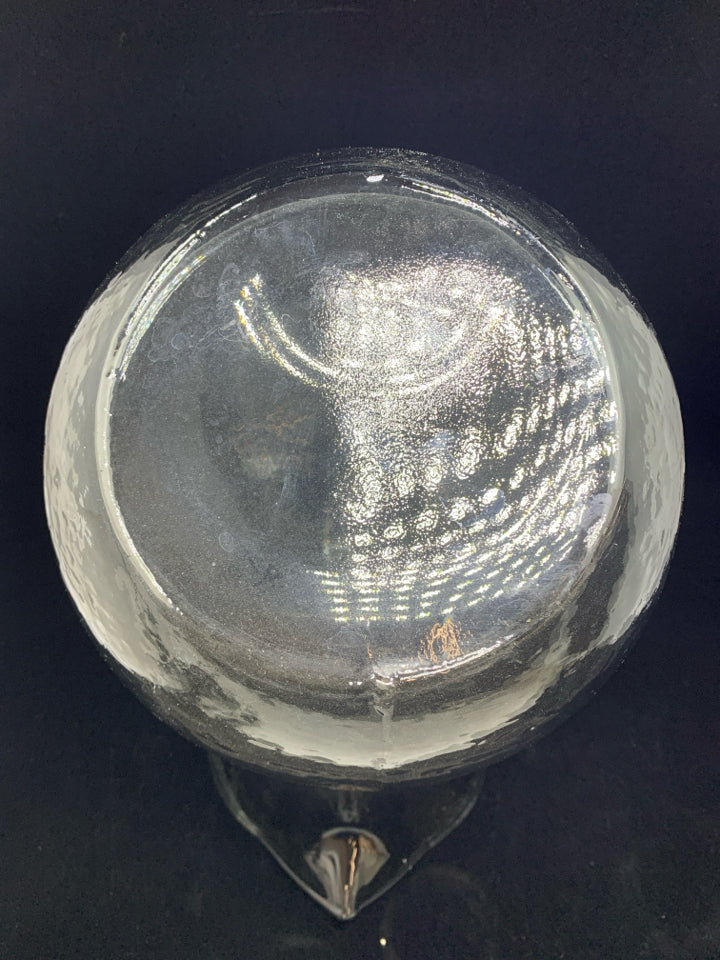 TILTED BLOWN GLASS PITCHER.