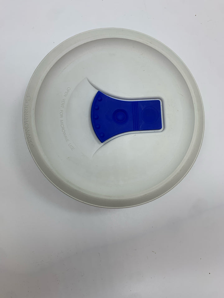 COVERED CORNING WARE DISH.
