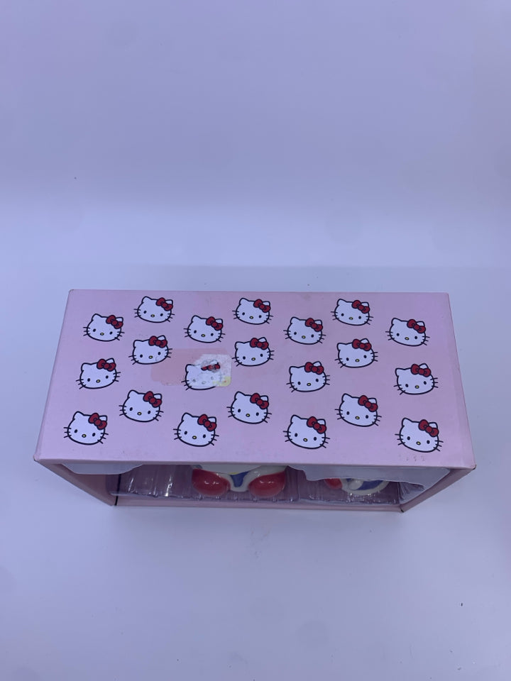 NIB HELLO KITTY MUG AND FIGURINE SET.