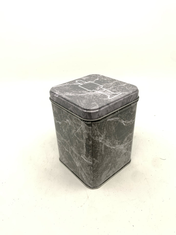 GREY AND WHITE MARBLE TIN.