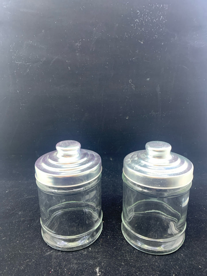 2 GLASS CANISTER W SILVER TOP.