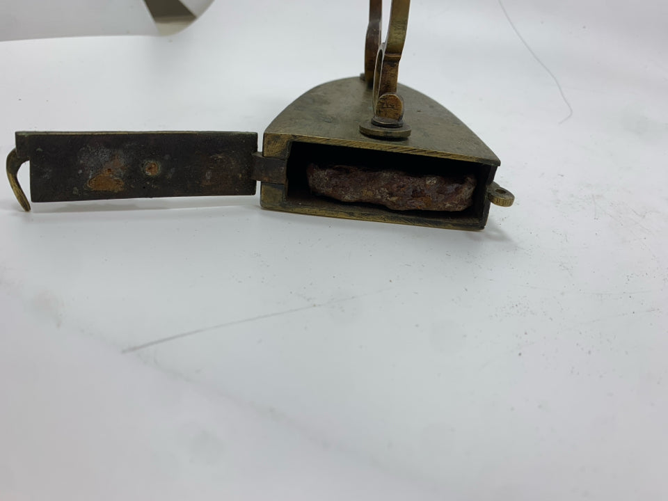 GOLDEN METAL SAD IRON DOOR STOPPER.