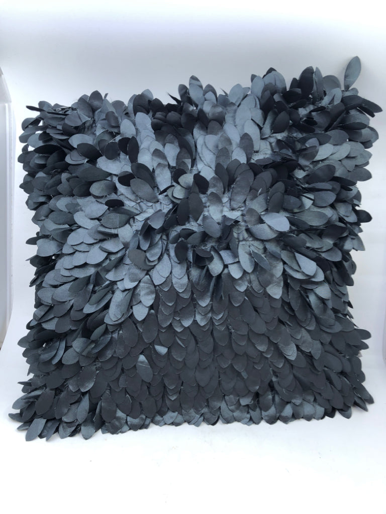 BLACK TEXTURED ACCENT PILLOW.