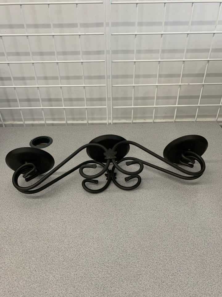 3 TIER PILLAR WROUGHT IRON CANDLE HOLDER.