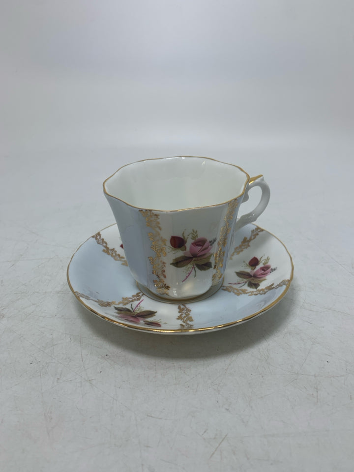 LIGHT BLUE/WHITE STRIPED TEACUP W/ PINK ROSES.