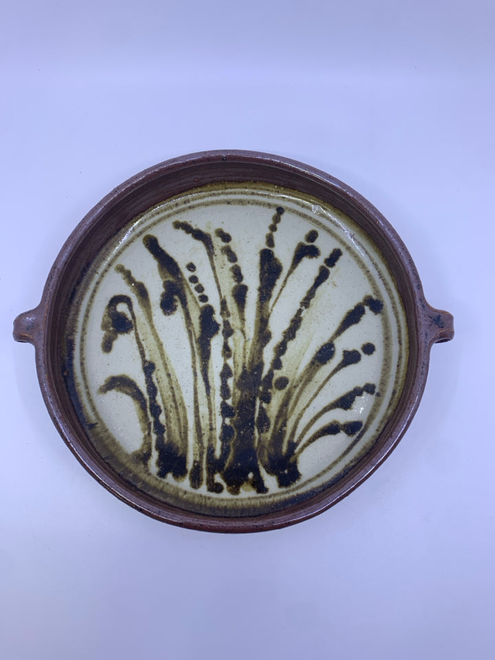 BROWN POTTERY DISH WITH HANDLES.