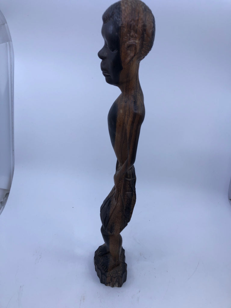WOOD CARVED CHILD STANDING.