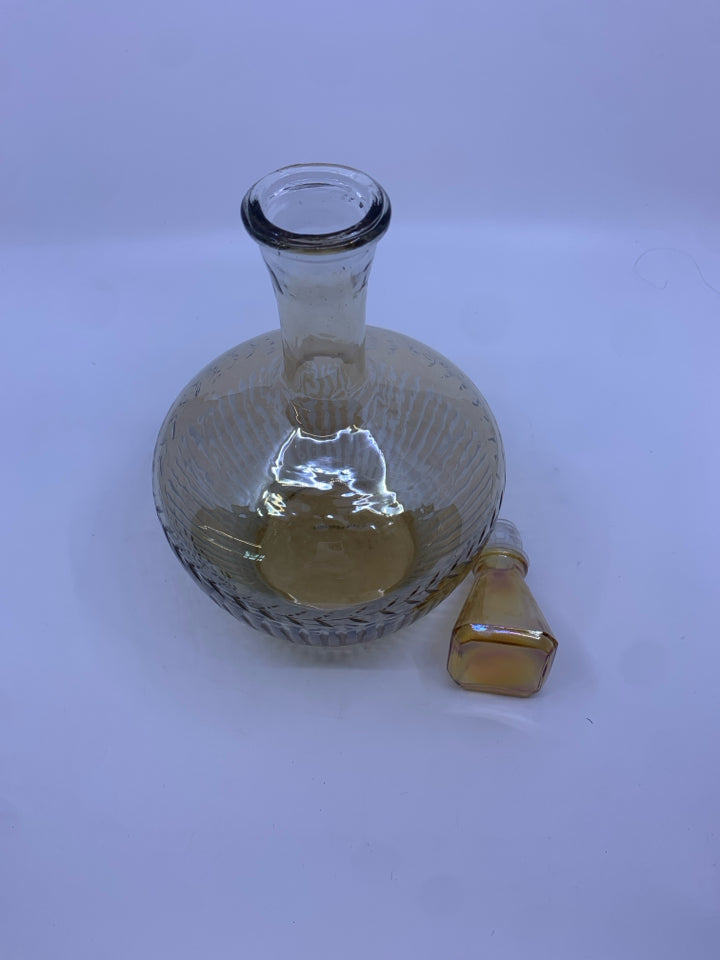 AMBER GLASS ETCHED DECANTER.