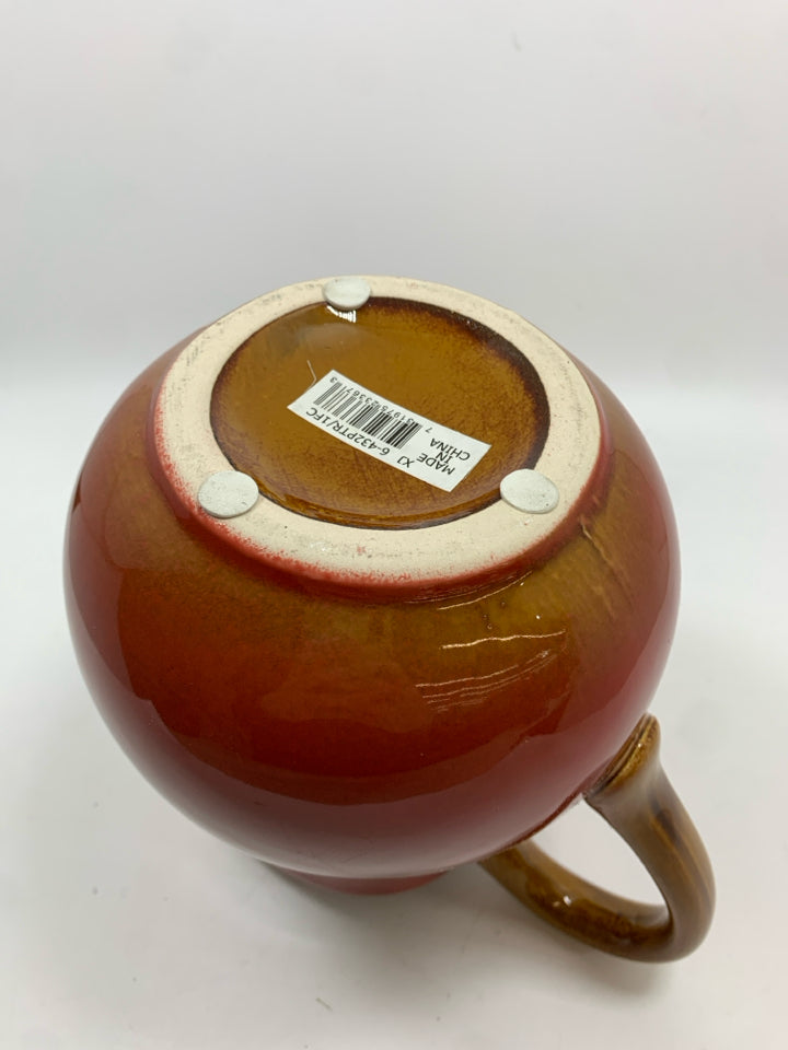 RED CERAMIC PITCHER.
