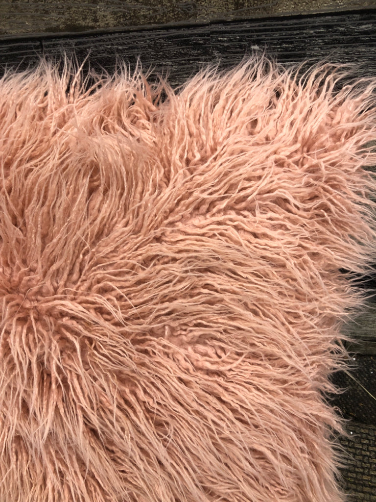 PINK SHAG PILLOW.
