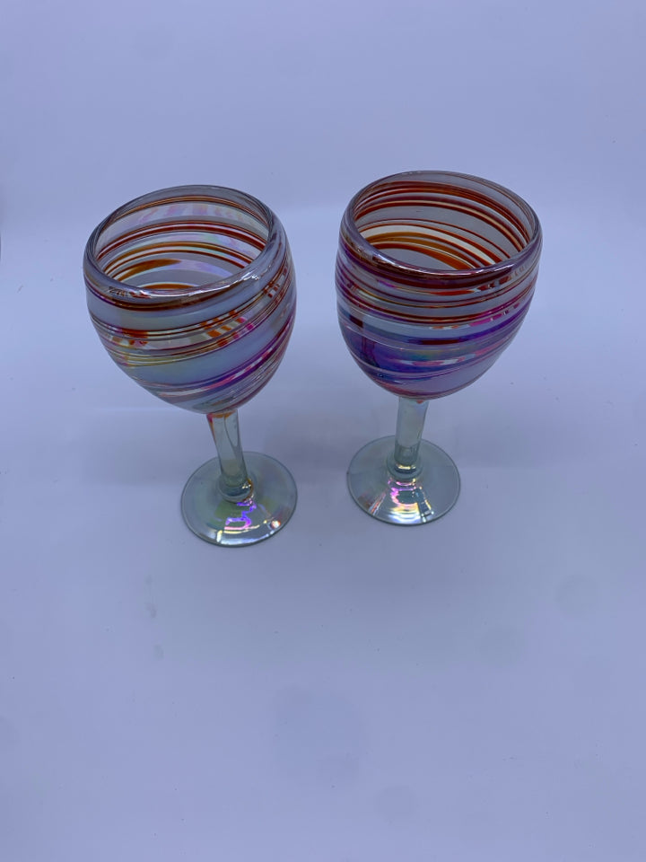 2 RED AND WHITE BLOWN GLASS WINE GLASSES.