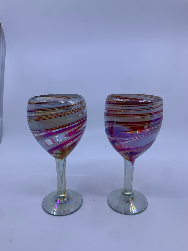 2 RED AND WHITE BLOWN GLASS WINE GLASSES.