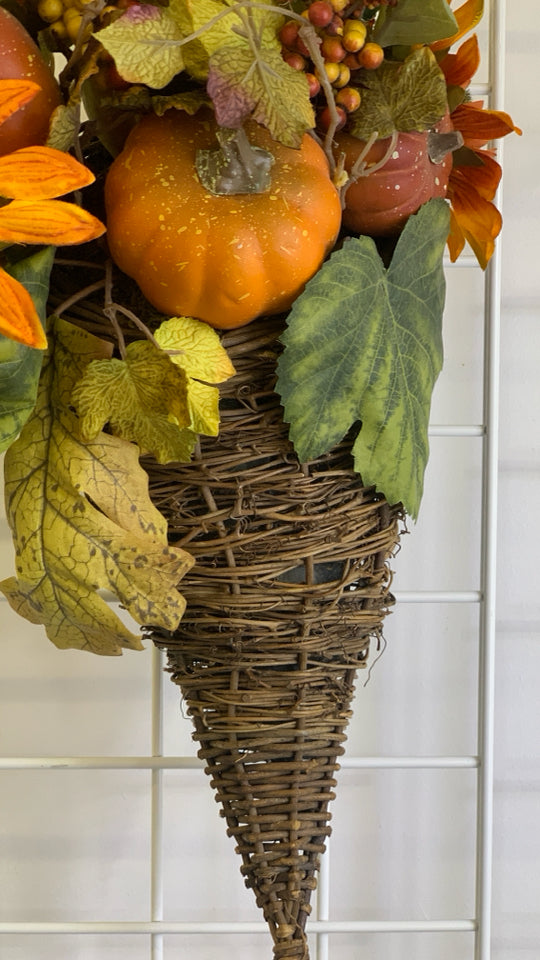 FAUX ORANGE CORNUCOPIA FLORAL ARRANGEMENT.