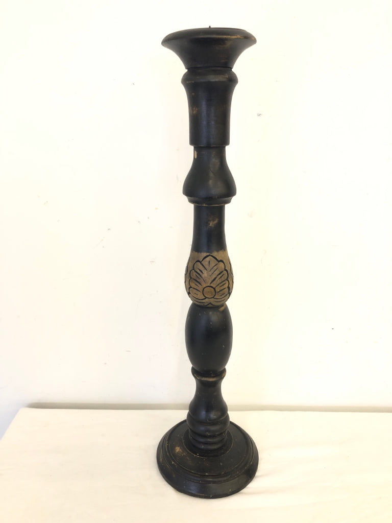 BLACK DISTRESSED CARVED PILLAR CANDLE HOLDER.