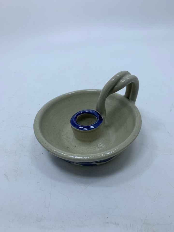 GRAY POTTERY TAPERED CANDLE HOLDER W/ BLUE FLOWER/HANDLE.