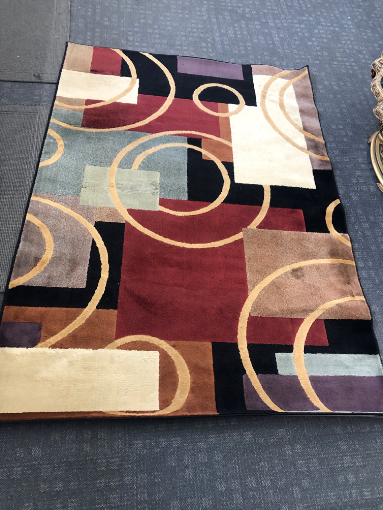 MULTI-COLORED CONTEMPORARY SHAW LIVING RUG.