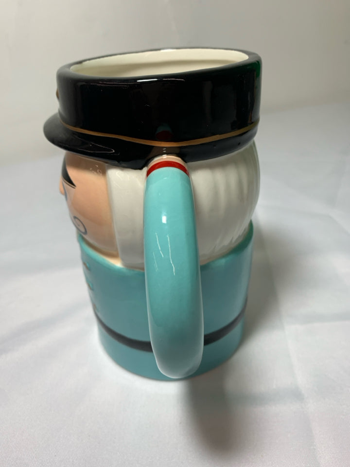 BLUE NUTCRACKER MUG.