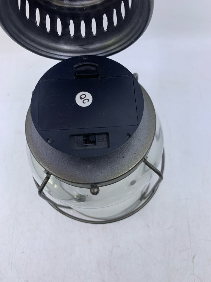 GREY METAL W/ GLASS BATTERY POWERED LANTERN.