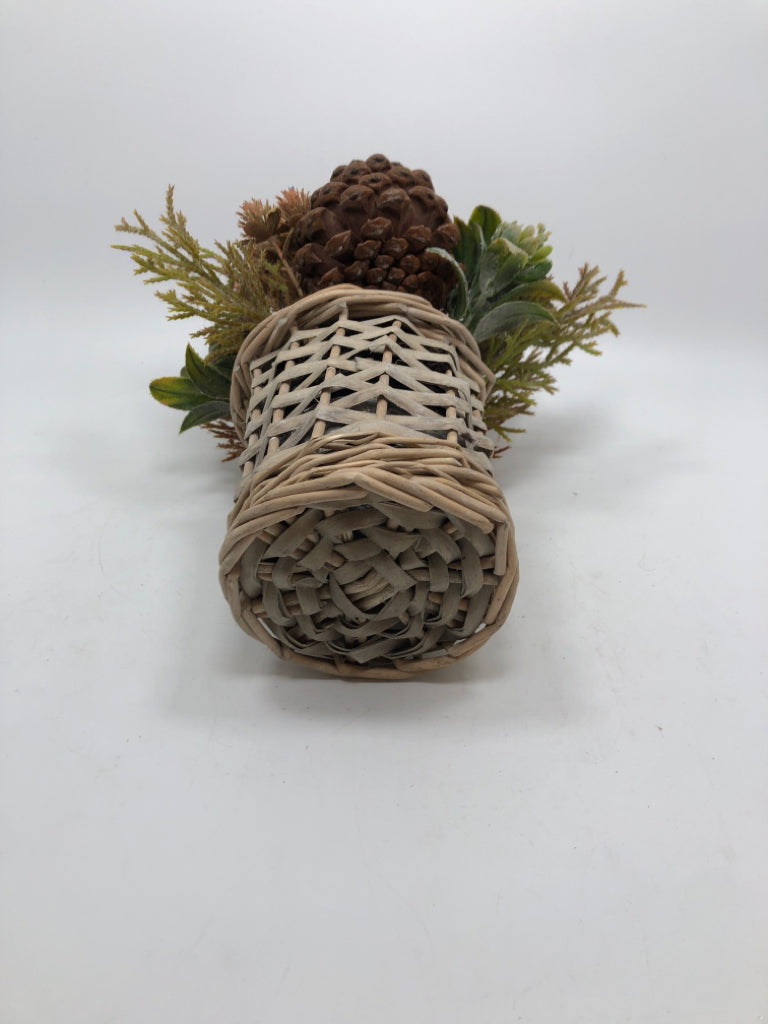 SM FAUX GREENERY ARRANGEMENT W/PINECONES IN WICKER VASE.