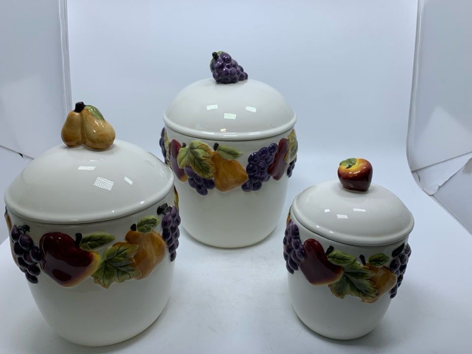 3 CERAMIC EMBOSSED FRUIT CANISTERS.