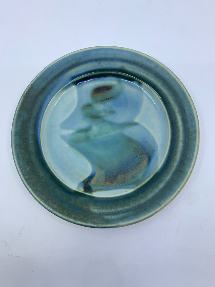 TEAL AND LIGHT BLUE POTTERY PLATE.