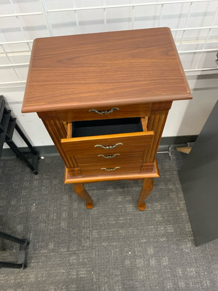 FAUX BROWN WOOD JEWELRY ARMOIRE.