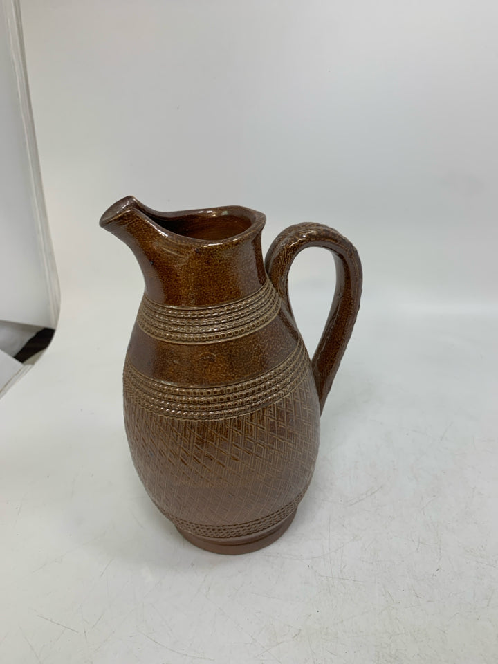 TEXTURED IRIDESCENT PITCHER W/ SHARP LIP.