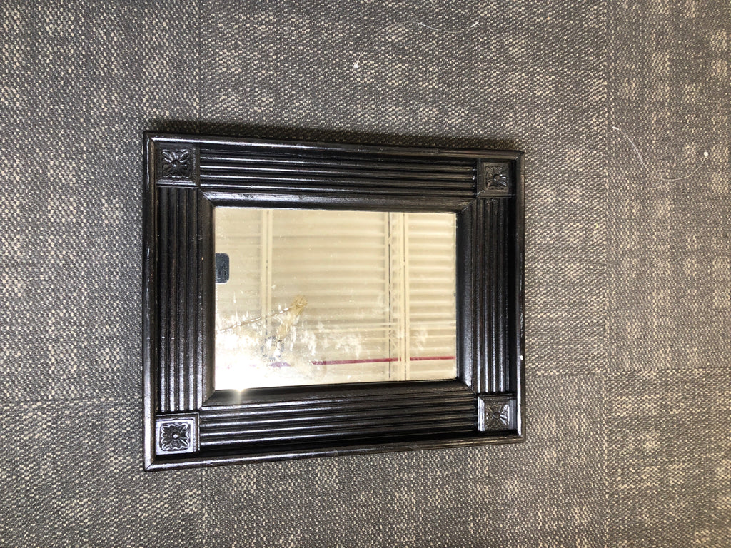 BLACK FRAMED MIRROR.