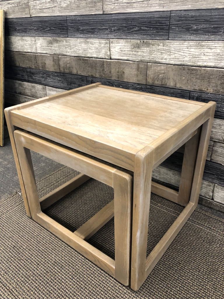 2 GREY WASHED NESTING TABLES.