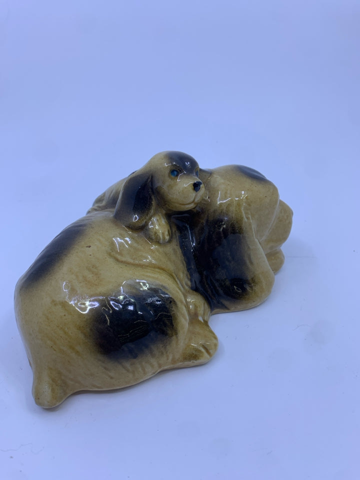 CERAMIC SLEEPING DOG FIGURE.