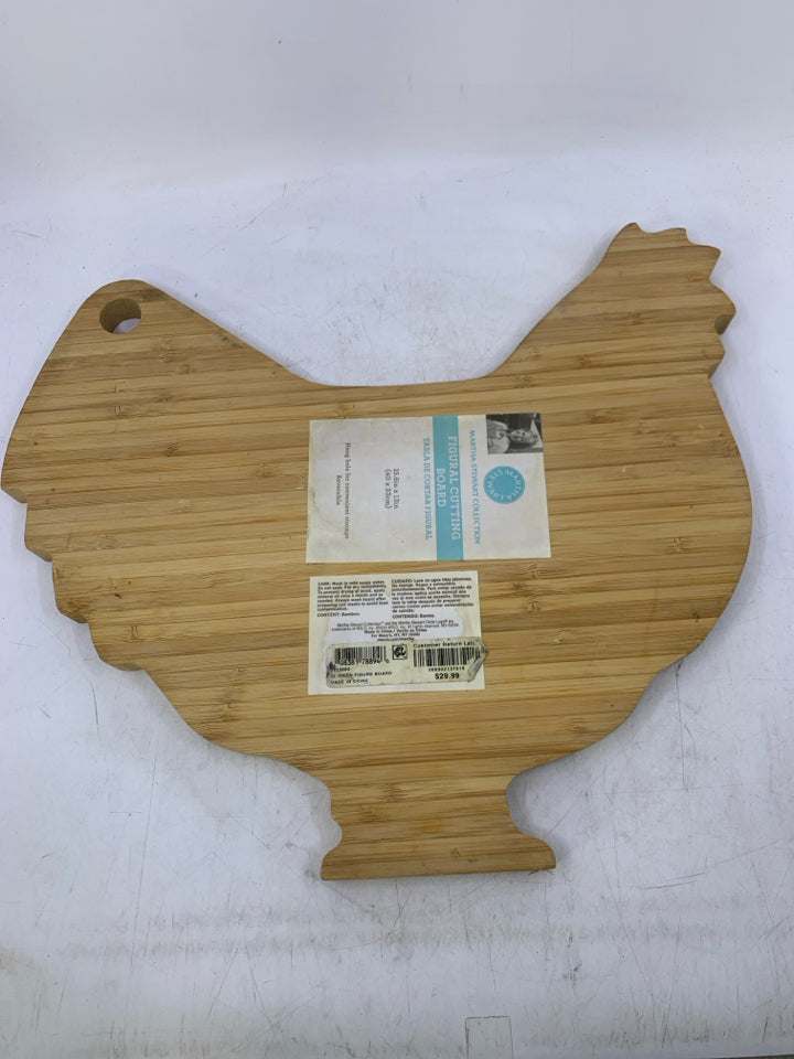 BLONDE HEN SHAPED CUTTING BOARD.