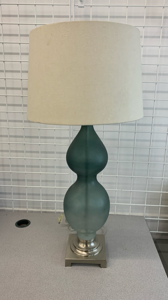 TEXTURED BLUE HOUR-GLASS SHAPED LAMP W/BARREL SHADE.