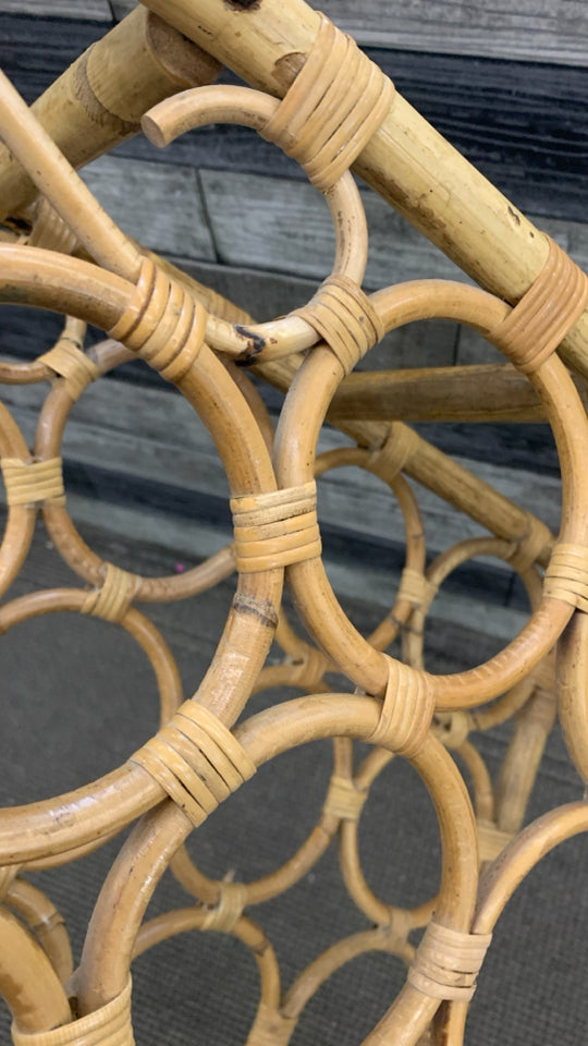 RATTAN WINE HOLDER.