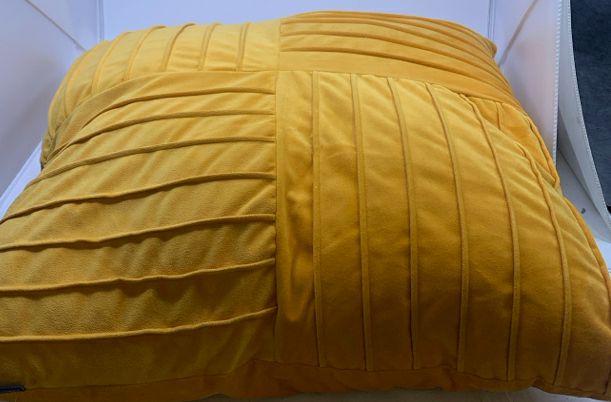 LARGE ORANGE PILLOW.