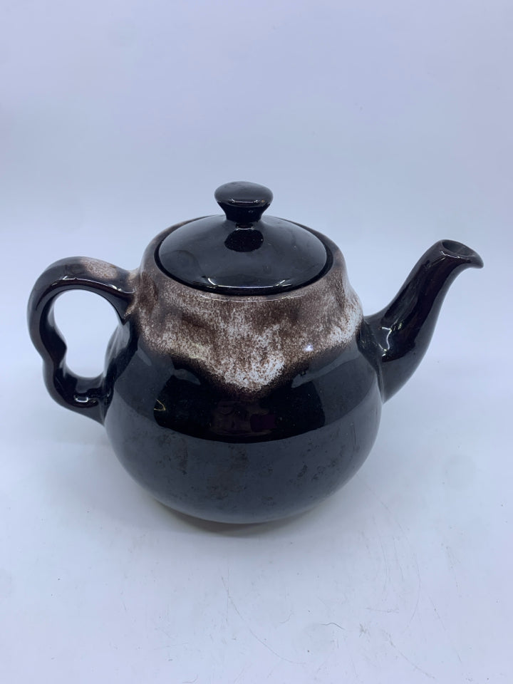 BLACK W WHITE POTTERY TEAPOT.