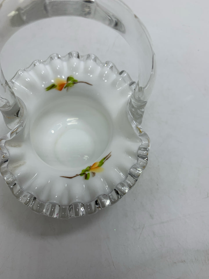 MILK GLASS BASKET W/ PAINTED YELLOW FLOWERS CLEAR HANDLE.