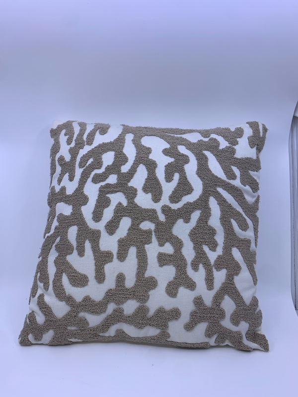 TAN AND WHITE CORAL PATTERN SQUARE PILLOW.